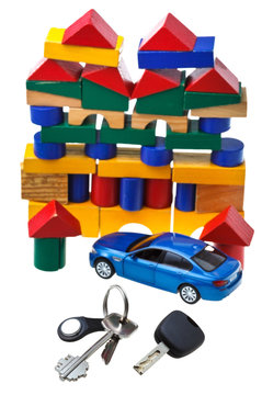 door, vehicle keys, blue car model and block house