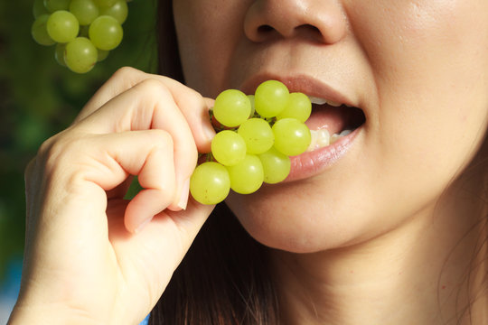 Woman Eating Green Grapes Friut