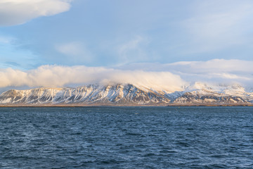 View of mountains across the harbor in downtown Reykjavik