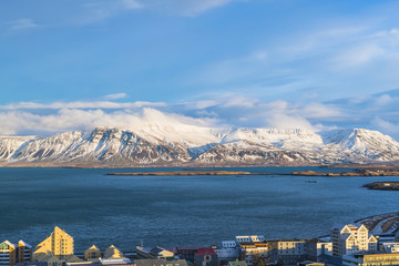 View of Reykjavik and mountains across the harbor, Iceland - obrazy, fototapety, plakaty