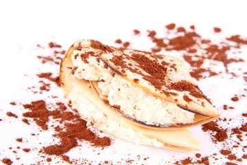 Pancake with cottage cheese (mixed with yolk & brown sugar) decorated with cocoa