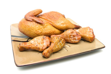 roast chicken carcass and chicken legs on a white background