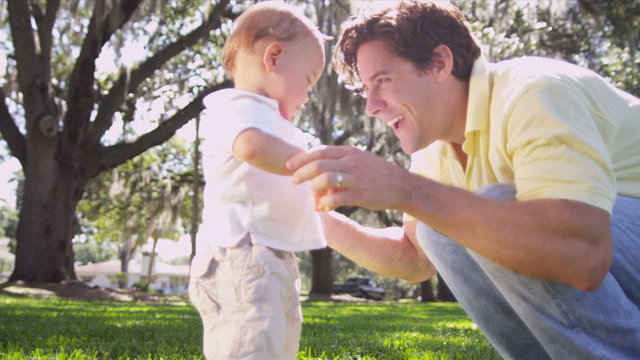 Loving Caucasian Father Fun Playing Toddler Boy Park