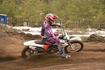 MX racer leaves the deep sandy ruts