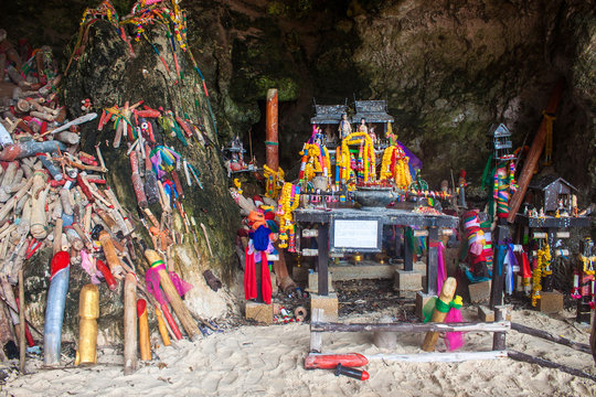 Carved wooden phalluses in Princess cave, Railay, Thailand.