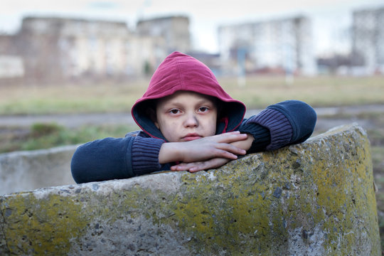 portrait of a homeless boy