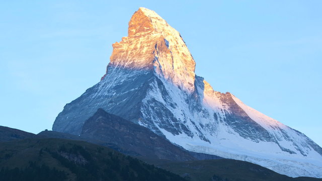 Motion time lapse sun rising Matterhorn Peak, Zermatt