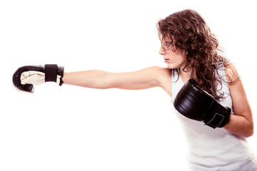 Sport boxer woman in gloves. Fitness girl training kick boxing.