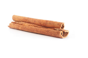 Cinnamon sticks on white background