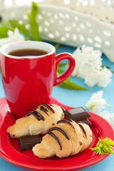 Homemade mini croissants with chocolate.