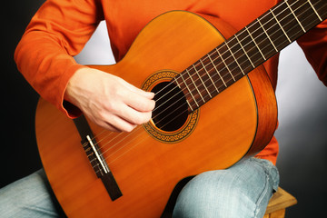 Acoustic guitar player close up