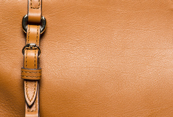 Macro of yellow leather and buckle