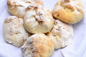 Homemade cakes covered with icing sugar