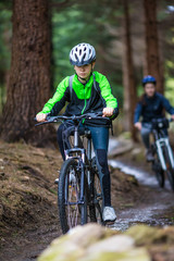 Healthy lifestyle - teenage girl and boy biking
