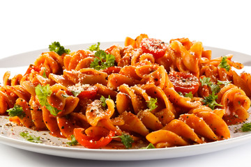 Pasta with meat, tomato sauce, parmesan and vegetables