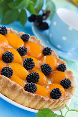 tart with peaches and blackberries.