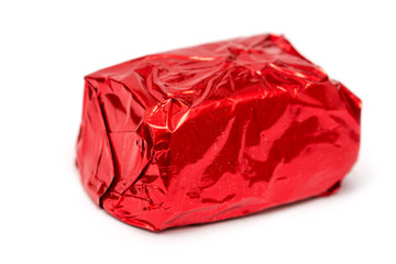 Red Wrapped Chocolate Candy Isolated On White