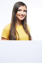 Young smiling woman show blank card. 
