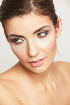 Close up portrait of beautiful young woman face.