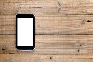 Smartphone on wooden background
