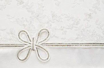 Fototapeta na wymiar Wedding bow on lace