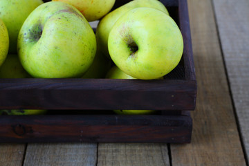 green apples in crate
