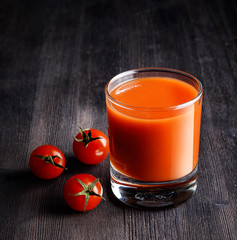 Glass of tomato juice on a table