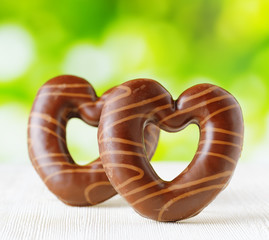 Chocolate hearts on nature backgroud