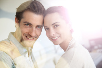 Sweet middle-aged couple embracing each other