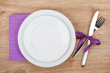 Fork with knife, blank plates and napkin