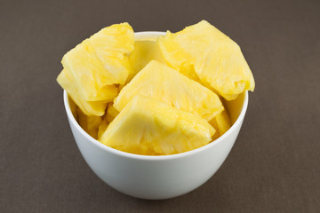 Fresh Pineapple Slices in Bowl