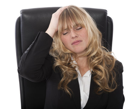 Businesswoman with a migraine or headache