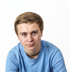 Fototapeta premium boy with blue shirt posing in studio