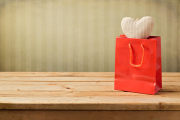 Valentine's day background with shopping bag and heart shape