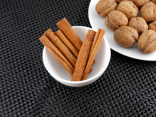 walnut set and cinnamon set on white plate
