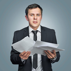 young manager with papers
