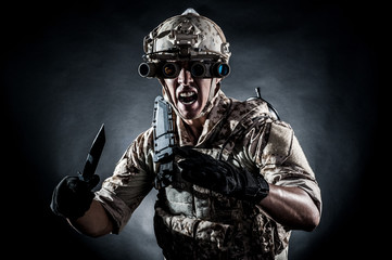 soldier man hold knife fashion