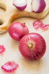 Red onion with cutting board