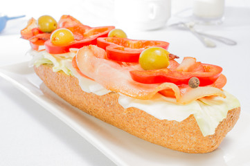 Sandwich with bacon and vegetables