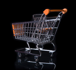 Empty Shopping Cart isolated in black