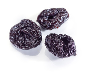 Dried plums. Prunes isolated on white.