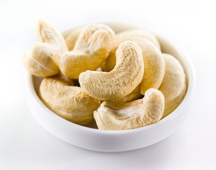 Cashew. Heap of nuts isolated on white background