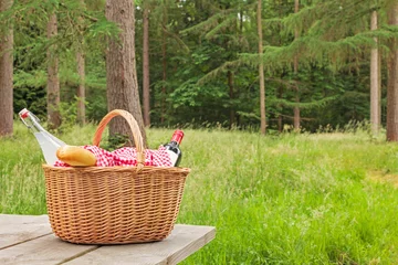 Wall murals Picnic Picnic basket in a woodland setting