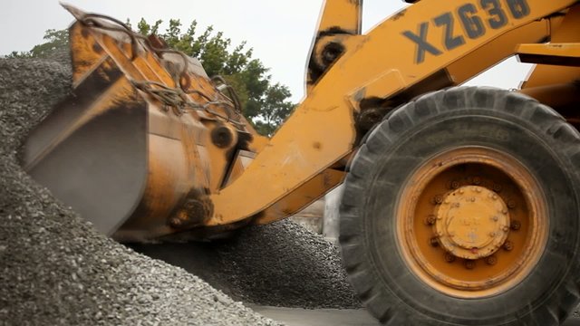 excavator transports rubble