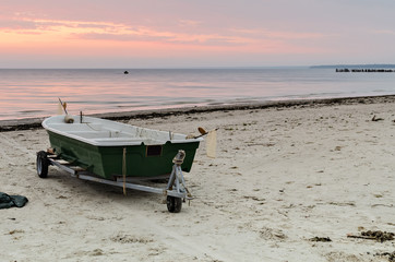 Old fishing boat at dawn, Baltic Sea, Latvia, Europe