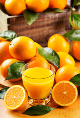 glass of orange juice with fresh fruits