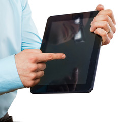Businessman monitoring stock market graphs on his tablet