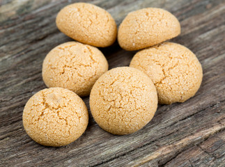 Fototapeta na wymiar amaretti cookies on wooden surface