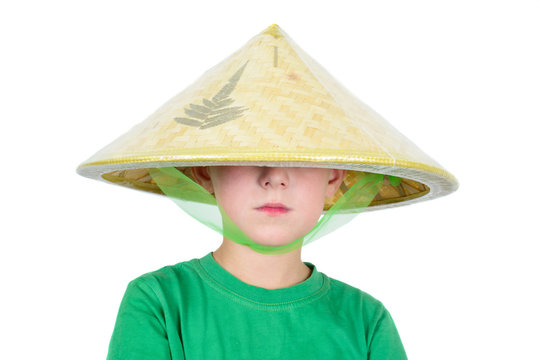 Boy in asian hat