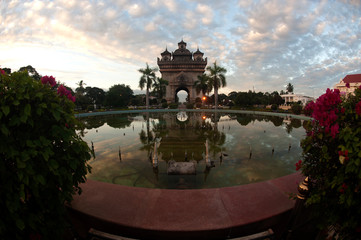 Patuxay at sun-up in Vientiane , Loas .